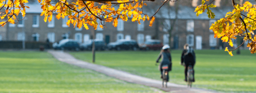 Hire bike cycling across Jesus Green Cambridge  